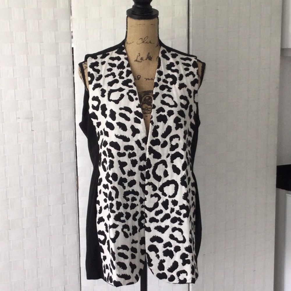 Ann Loy can dress up a outfit with this  black and white Vest size M  #387